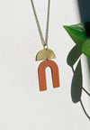 Geometric Terra Cotta Leather Arch Brass Accent Necklace